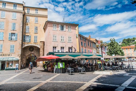 Porte Massillon and café terraces in Hyères in France