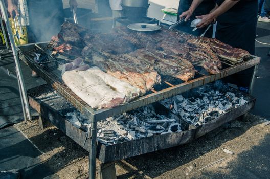 Peruvian food: roasted pork with charcoal or stick