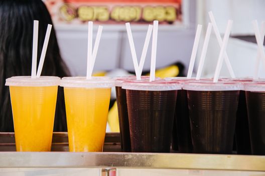 purple corn juice called chicha morada in Peru and next to it pineapple juice
