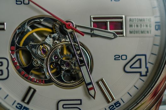 Mechanisms of a hand clock, macro photo of a hand clock