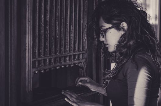 Woman buying tickets for train or for the excursion to the ancient city