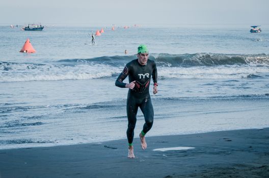 LIMA, PERU - APRIL 22th 2018: Ironman 70.3 . Starting for the swimming test of the athletes of the Ironman 70.3