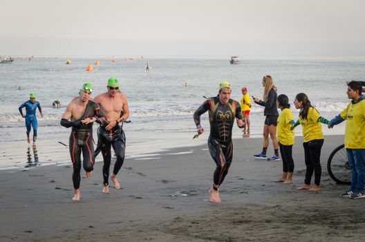 LIMA, PERU - APRIL 22th 2018: Ironman 70.3 . Starting for the swimming test of the athletes of the Ironman 70.3