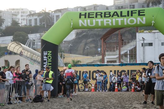 LIMA, PERU - APRIL 22th 2018: Ironman 70.3 . End of the first stage of the competition to then go to cycling