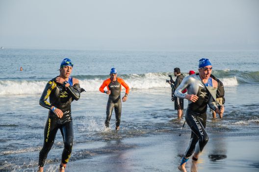 LIMA, PERU - APRIL 22th 2018: Ironman 70.3 . Starting for the swimming test of the athletes of the Ironman 70.3
