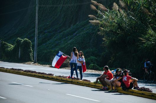 LIMA, PERU - APRIL 22th 2018: Ironman 70.3 . Public spectator supporting his country or relatives in the race