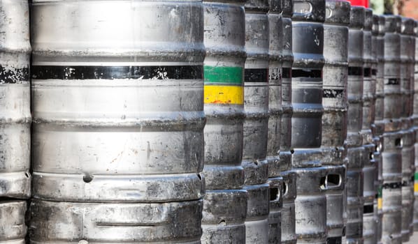 6 steel beer barrels with colored stripes