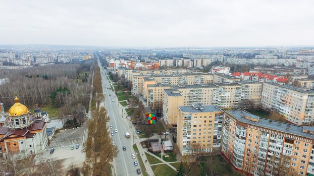 Aerial view of city road and moving cars and park from a bird's eye view. Ukraine Ternopil