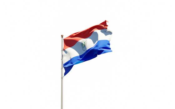 Beautiful national state flag of Paraguay fluttering at sky background. Low angle close-up Paraguay flag 3D artwork.