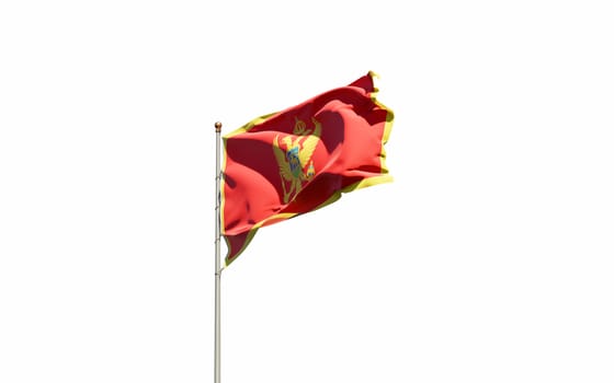 Beautiful national state flag of Montenegro fluttering at sky background. Low angle close-up Montenegro flag 3D artwork.
