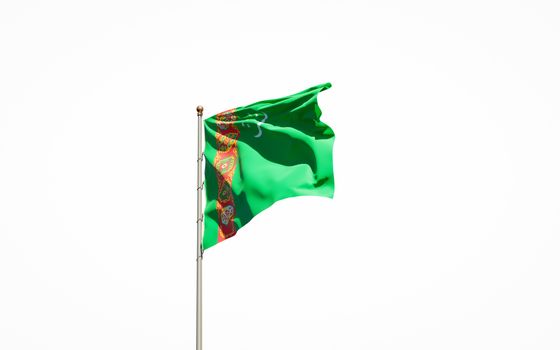 Beautiful national state flag of Turkmenistan on white background. Isolated close-up Turkmenistan flag 3D artwork.