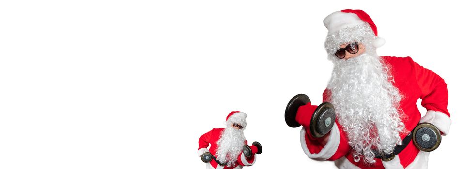 Santa Clauses working out, lifting dumbbells and doing bicep curls. One little santa facing a big santa. Isolated on white background. Sport, fitness, bodybuilding conept. Banner size, copy space.
