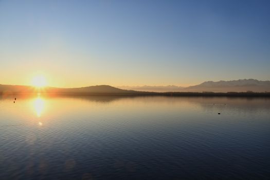 Sunset on the waters of Lake Viverone