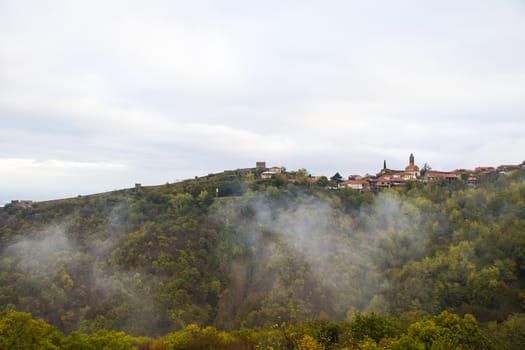 Sighnaghi village landscape and city view in Kakheti, Georgia. Old houses beautiful view during mist and fog