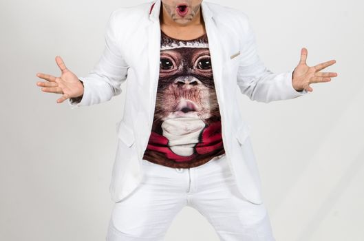 Portrait of astonished male model with barba , bristle opening his mouth with surprisment hearing terrified news. Excited man in formal clothes isolated over white background