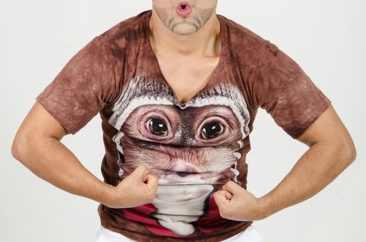 Man doing the Strong man pose, white background