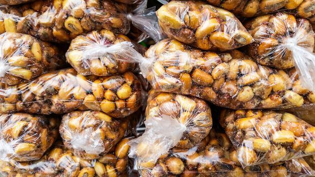 Close-up of Cancha, Andean toasted Chulpe corn or Maiz Chulpe, the Peruvian tasty corn snack.