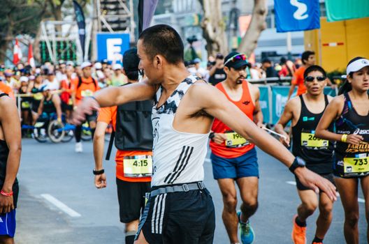 Lima, Peru - May 20th 2018: Marathon Lima 42k, sporting event that gathers athletes from all over the world. Athletes warming up before the marathon