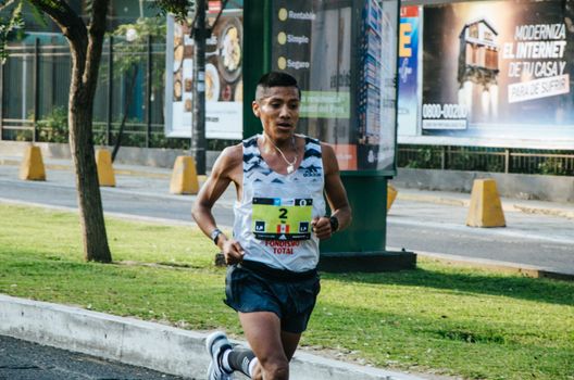 Lima, Peru - May 20th 2018: Marathon Lima 42k, sporting event that gathers athletes from all over the world. Nelson Ito, Peruvian athlete, third place in the marathon.