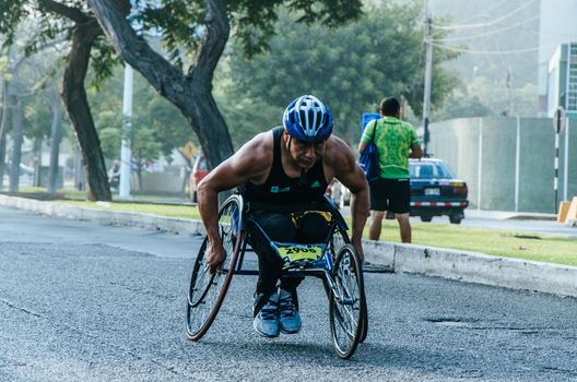 Lima, Peru - May 20th 2018: Marathon Lima 42k, sporting event that gathers athletes from all over the world. Athlete in a wheelchair.
