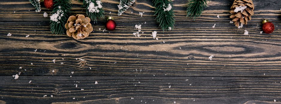 Christmas holiday composition decoration on wooden background, new year and xmas or anniversary with presents on wood table in season, top view or flat lay, banner website.
