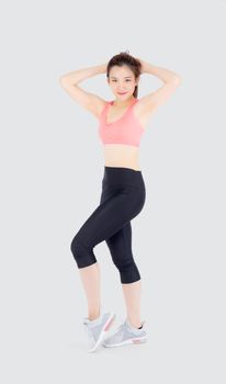 Beautiful portrait young asian woman standing workout stretch muscle arm with healthy isolated on white background, asia girl wear sport clothes exercise and yoga for health, wellness concept.