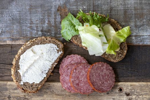 bread with horseradish spread and salami