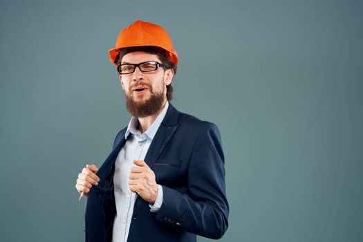 man in orange suit hard hat engineer construction work lifestyle official. High quality photo