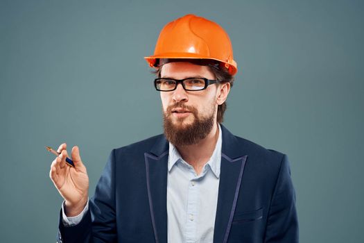 Cheerful man with glasses construction safety by industry professional lifestyle. High quality photo