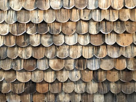 Old wooden roof vintage tiles background detail and close up 