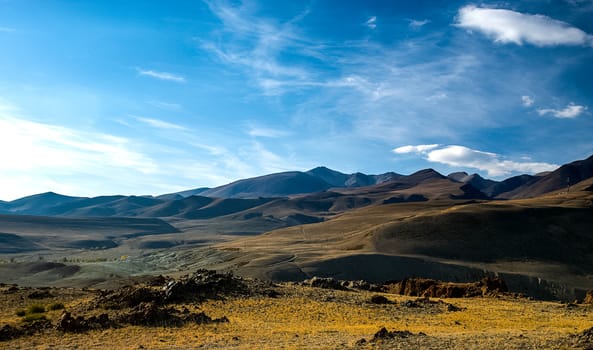 Mountains and hills altai in autumn, panoramic photo. Mountains and hills altai in autumn, panoramic photo.