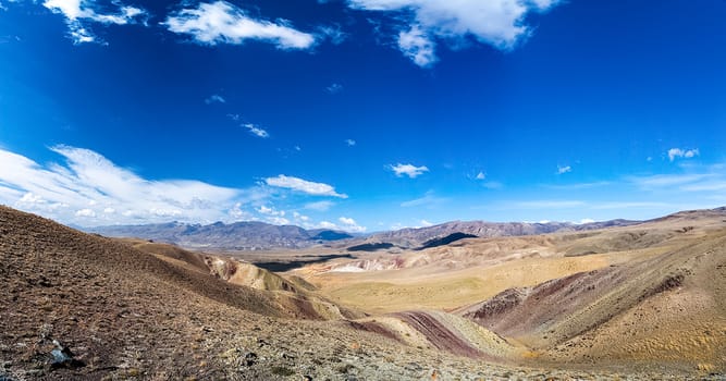 Mountains and hills altai in autumn, panoramic photo. Mountains and hills altai in autumn, panoramic photo.