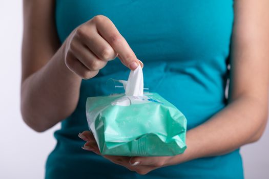 Taking baby wipes from the packaging - hygiene procedure and prevention of infectious diseases