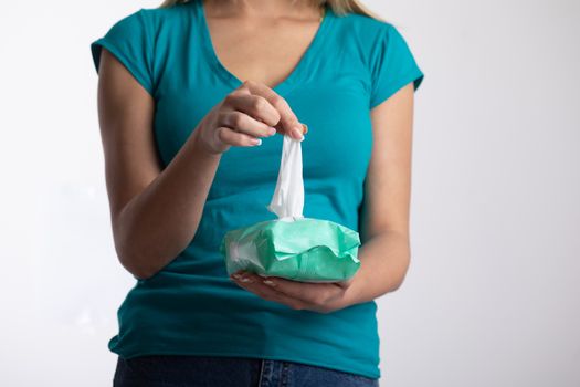 Taking baby wipes from the packaging - hygiene procedure and prevention of infectious diseases