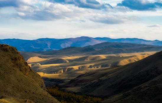Mountains and hills altai in autumn, panoramic photo. Mountains and hills altai in autumn, panoramic photo.