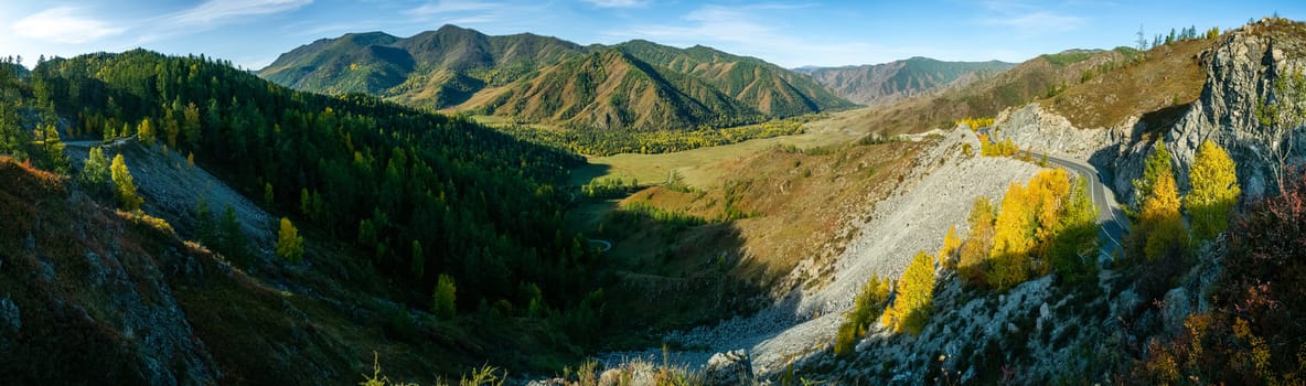 Mountains and hills altai in autumn, panoramic photo. Mountains and hills altai in autumn, panoramic photo.