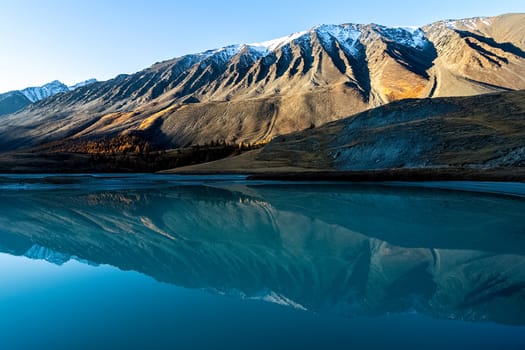 Mountain lake among the mountains on altai. The water surface of the lake.