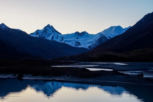 Mountain lake among the mountains on altai. The water surface of the lake.