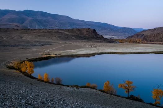 Mountain lake among the mountains on altai. The water surface of the lake.