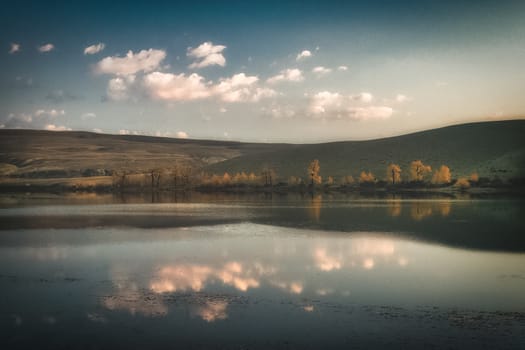 Mountain lake among the mountains on altai. The water surface of the lake.