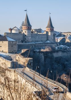 Kamianets-Podilskyi, Ukraine 01.07.2020. Panoramic view of the Kamianets-Podilskyi fortress on a sunny winter morning