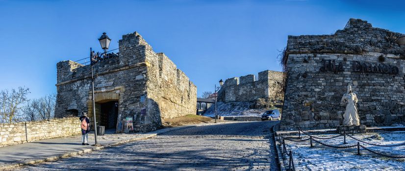 Kamianets-Podilskyi, Ukraine 01.07.2020. City gate of the Kamianets-Podilskyi old town on a sunny winter morning