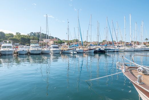 Discovery of the island of Porquerolles in summer. Deserted beaches and pine trees in this landscape of the French Riviera, Var.