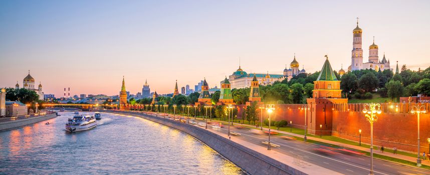 Panoramic view of the Moscow river and the Kremlin palace in Russia at sunset