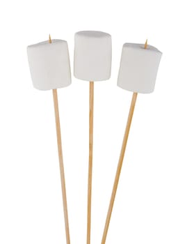 Marshmallow on a wooden stick isolated on white background