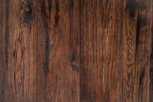 Dark wooden floor boards, view from above.