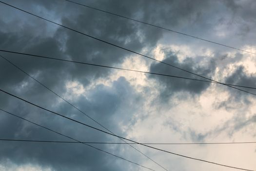 clouds after storm with black wires background