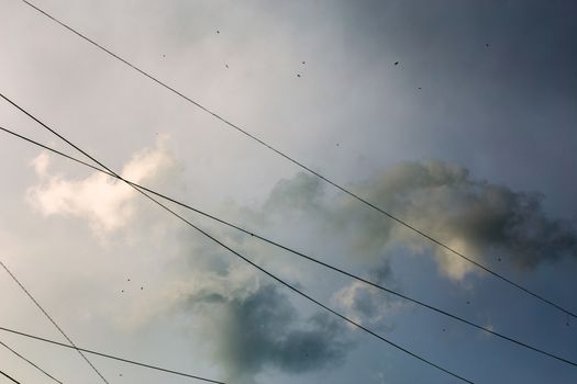 clouds after storm with black wires background