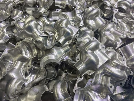 Shiny formed aluminium half body parts background