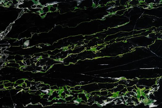 Black and green natural marble flat surface close-up texture